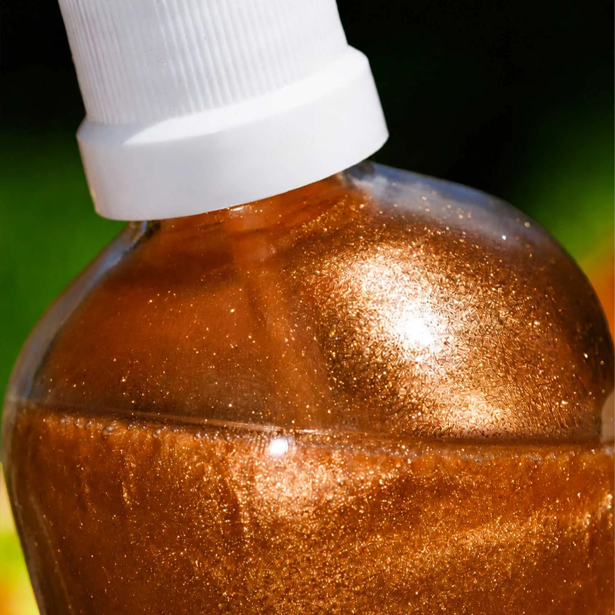 ILLUMINATING OIL WITH GOLD MICRO-PEARLS